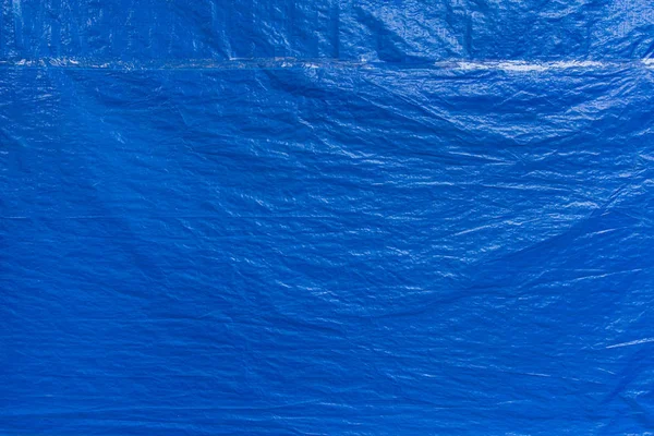 Bleu protecteur en plastique couverture texture motif fond — Photo
