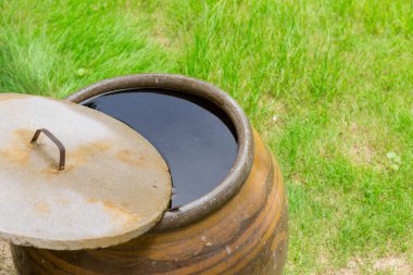 Yağmur suyu kavanoza, Tay geleneği ev tarzı tutmak.