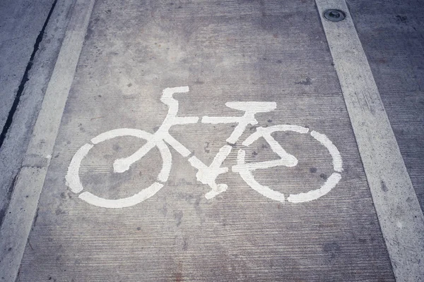 Bike Lane Symbol, Bicycle white sign on concrete road. — Stock Photo, Image