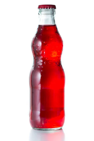 Softdrink, rote Farbe in Glasflasche. — Stockfoto