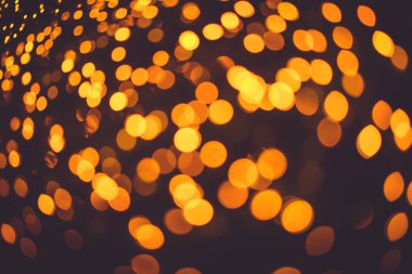 Bokeh açık vintage renkli gece şehir bulanıklık aydınlatma.