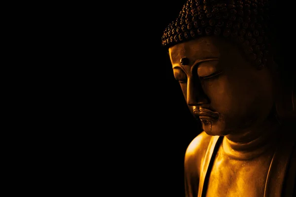 Primer plano cara de zen piedra arte buddha en oscuro para fondo asiático camino tranquilo de meditación y religioso . —  Fotos de Stock