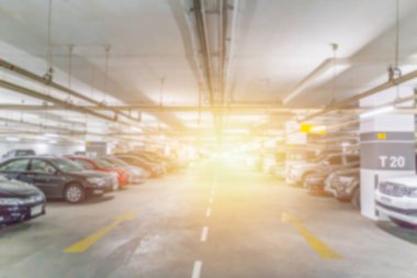arka plan tasarımı için güneş ışığı etkisi ile otopark bulanıklık.
