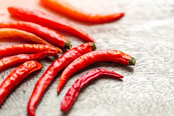 Closeup red hot chili on wood background. Thai kitchen hot and spicy food ingredient. — Stock Photo, Image
