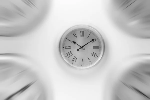 White clock time with zoom motion blur moving pass focus fast speed business hour concept. — Stok Foto