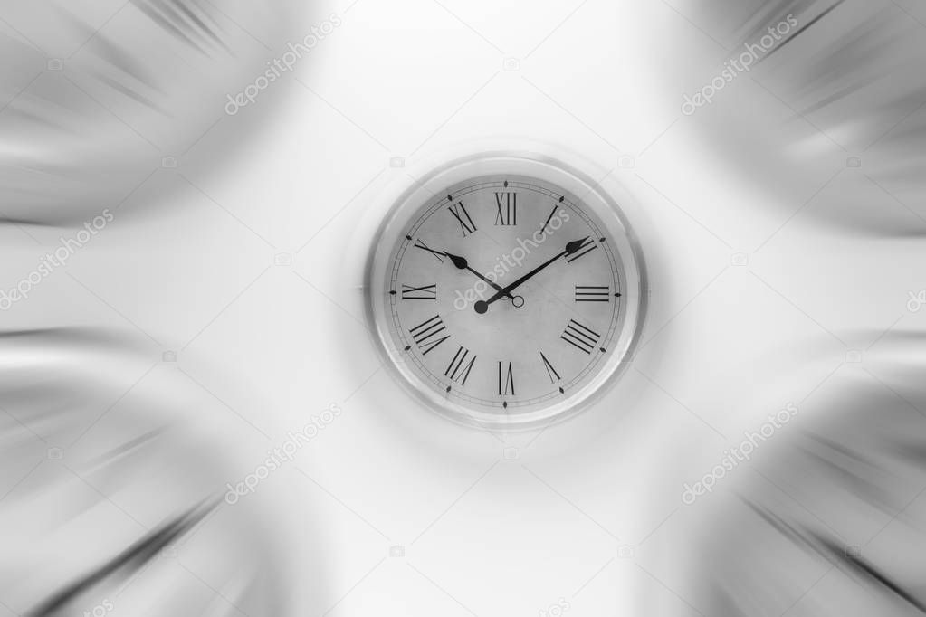 white clock time with zoom motion blur moving pass focus fast speed business hour concept.