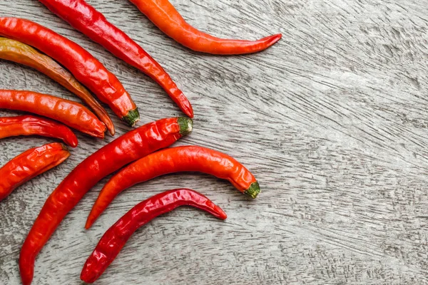Red hot chili on wood background. Thai kitchen hot and spicy food ingredient. — Stock Photo, Image