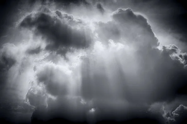 after rain storm sunlight pass through cloud with light ray vint
