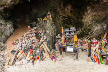 Wooden penis shrine in Princess cave (Phra Nang Shrine Temple) Krabi travel landmark  Thailand.
