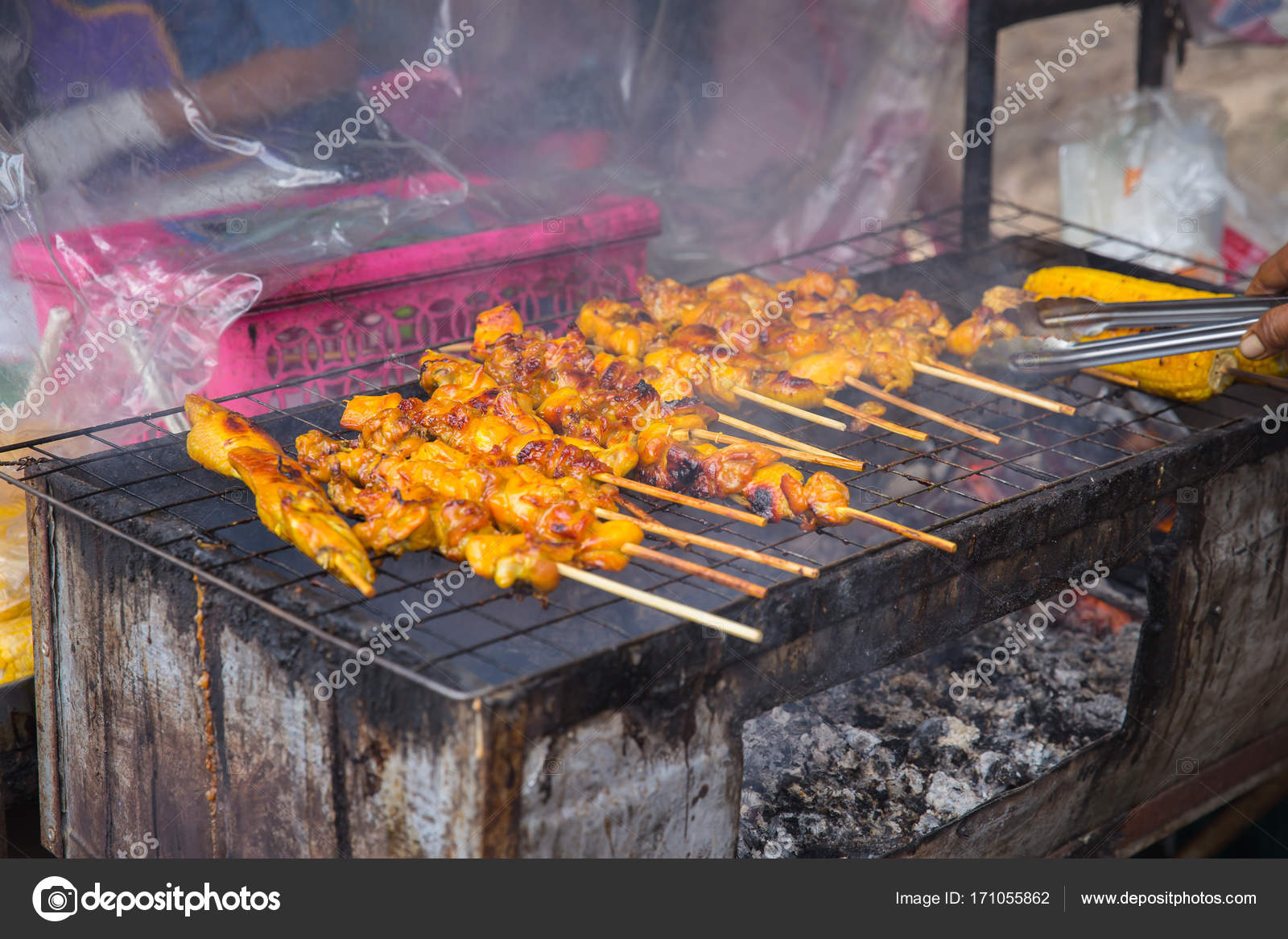 Unclean charcoal chicken stick meat grill unhealthy dirty smoke street