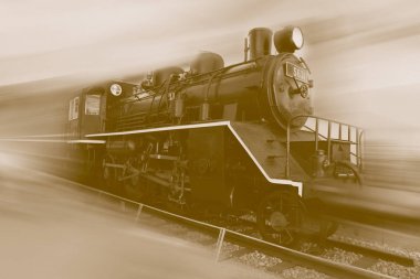Eski buharlı tren hareket ile çalışan bulanıklık etkisi vintage kahverengi renk tonlu.