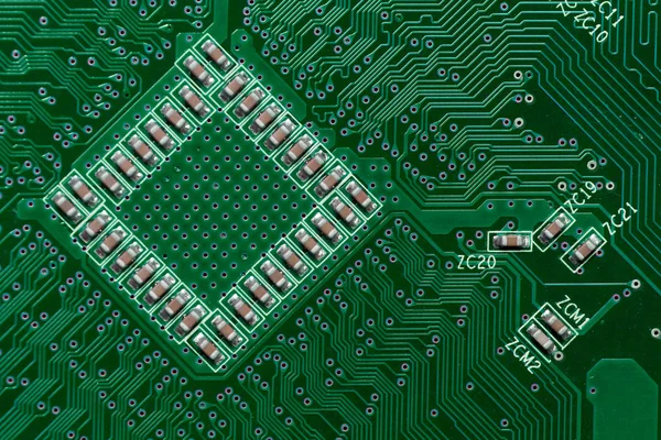 グリーン デジタル電子回路基板のテクスチャーにセラミック コンデンサー パターン背景 — ストック写真