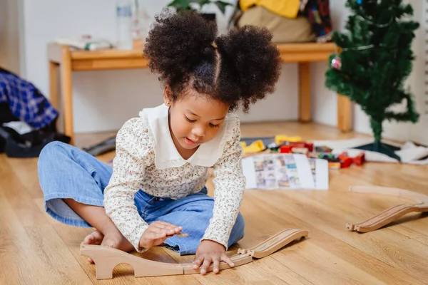 Little Cute Child Girl Enjoy Playing Wood Puzzle Wooden Floor — Stock Photo, Image
