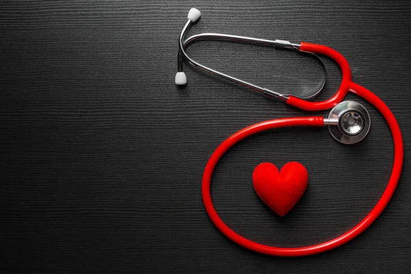 Stethoscope Doctor Red Heart Black Wooden Table Background Space Text — Stock Photo, Image