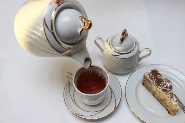 Tea Poured Teapot Mug Cake White Platter — Stock Photo, Image