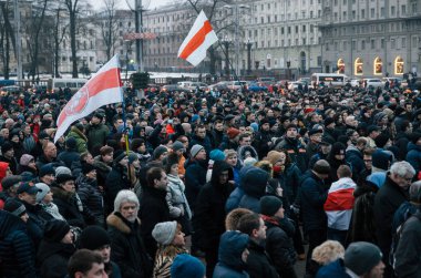 Belarusian people participate in the protest against the decree 3 in Minsk clipart