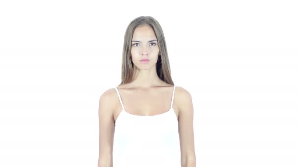 Tummen ner av vacker ung kvinna, vit bakgrund — Stockvideo
