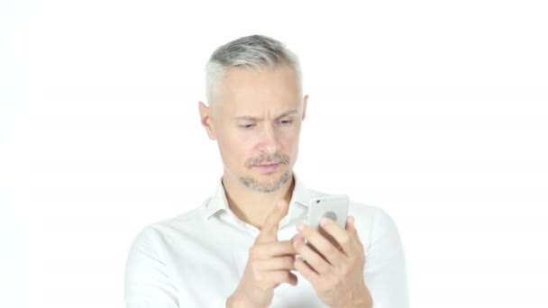 Businessman Using Smartphone On White Background — Stock Video