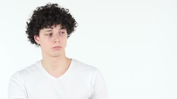 Pointing on Side, Young Man with Curly Hairs, white Background — Stock Video