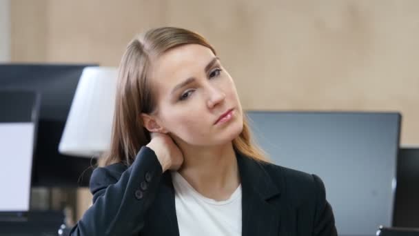 Tired Woman in Office with Neck Pain — Stock Video