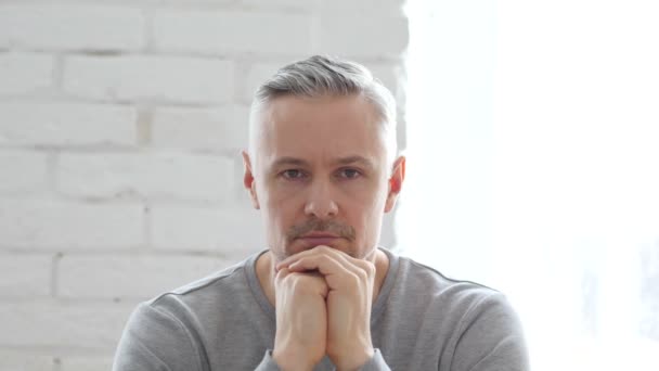 Serious Pensive Man Sitting in Office — Stock Video