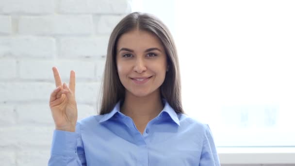 Portrait of Beautiful Young Woman Gesturing  Victory Sign — Stock Video