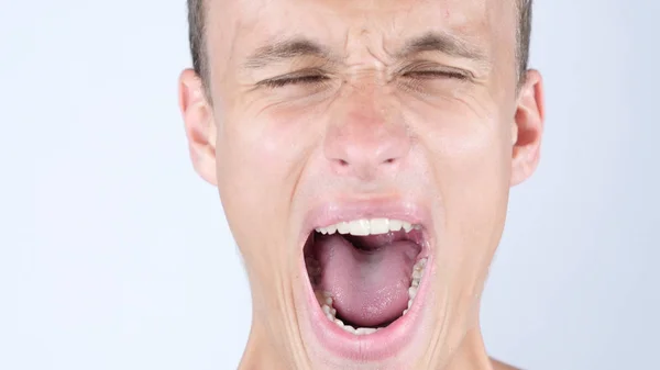 Close-up portrait of Angry ,upset ,depressesd ,young man screaming — Stock Photo, Image