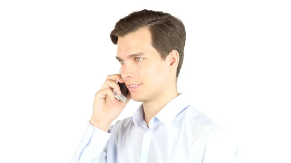 Młody biznesmen rozmawiający przez telefon komórkowy — Zdjęcie stockowe