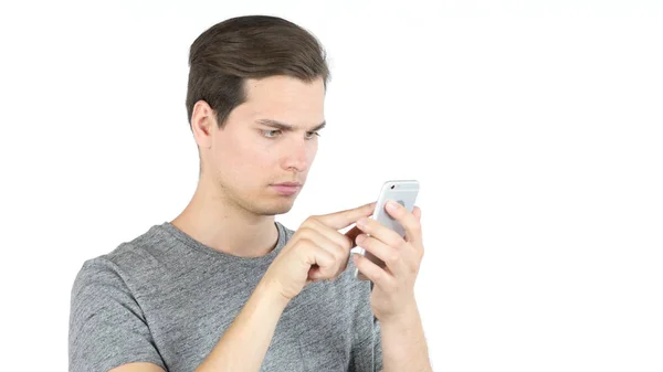 Estudante usando Smartphone em fundo branco. Navegação Online — Fotografia de Stock