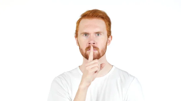 Sexy red hair man with finger on lips keeping a secret — Stock Photo, Image