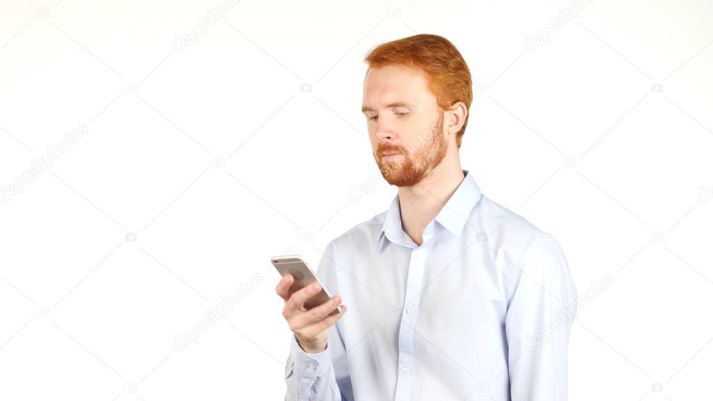 Portrait of business man using internet on smart phone
