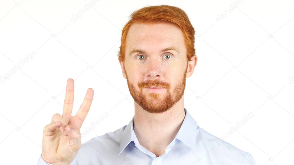 Portrait of Red Hair Man  gesturing Victory