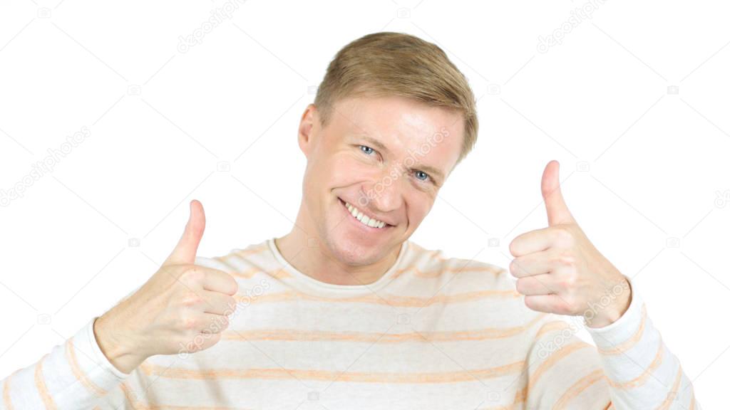 Portrait of young happy smiling man with thumbs up gesture. , white background