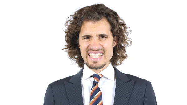 Uomo d'affari arrabbiato Rettifica denti, Capelli ricci — Foto Stock