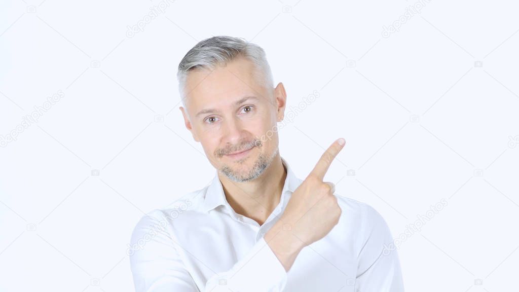 Businessman Pointing At Side , Copyspace