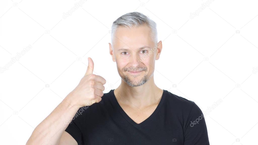 Thumbs Up by Confident Smiling Middle Aged Man, White Background