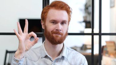 Sakallı adam Tamam işareti