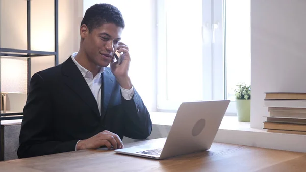 Phone Talk, Black Businessman Attending Call at Work