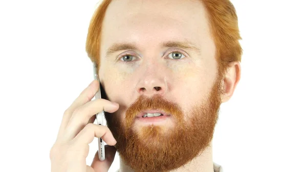 Närbild på telefonen talar om rött hår skägg Man — Stockfoto
