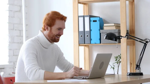 Online Discussion of Project  by Handsome Man with Red Hairs