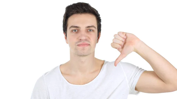 Thumbs Down by Handsome Man, White Background Royalty Free Stock Photos