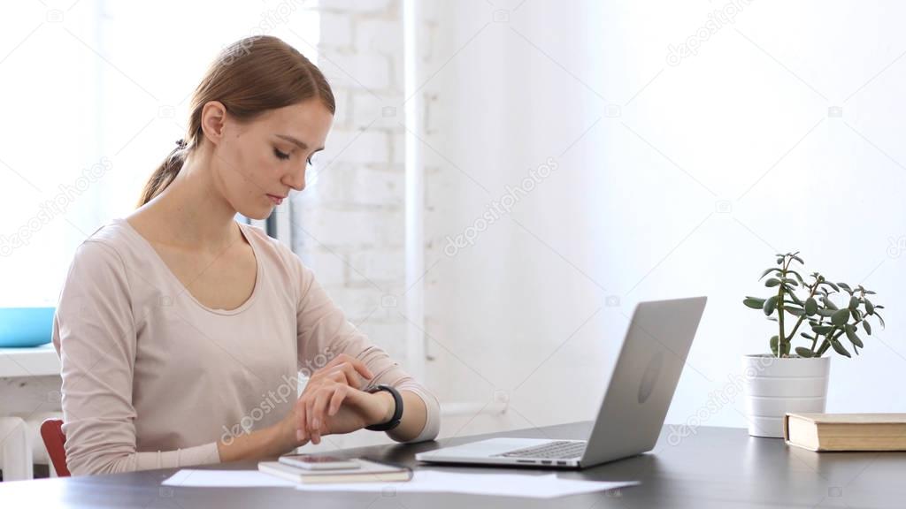 Creative Woman Using Smartwatch, Browsing