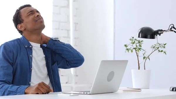 Pain in Muscles of Neck, Tired  Afro-American Man at Work