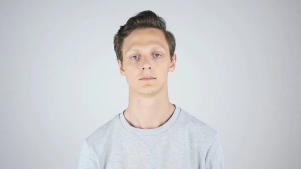 Portret van een jonge man, geïsoleerd op witte achtergrond — Stockfoto