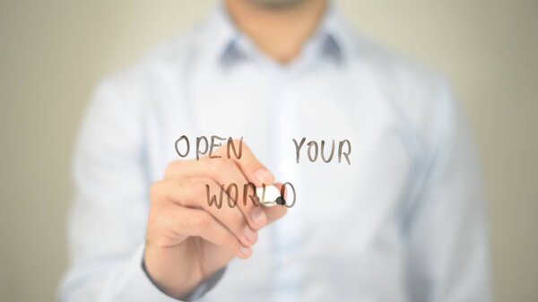 Open Your World , man writing on transparent screen