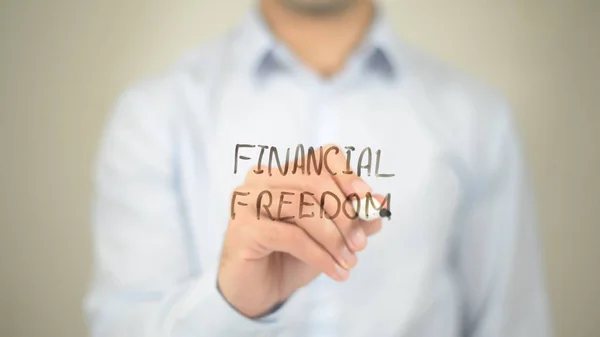金融の自由,透明画面上で書く男 — ストック写真