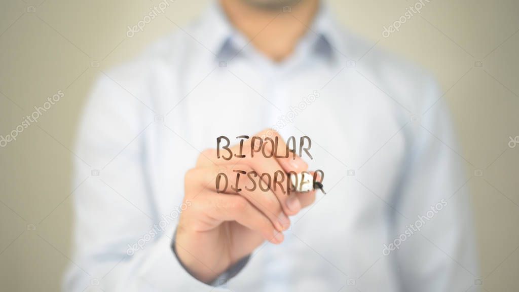 Bipolar Disorder , man writing on transparent screen