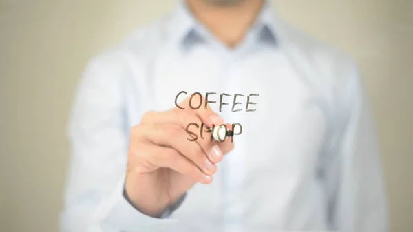 Café, Homem escrevendo na tela transparente — Fotografia de Stock