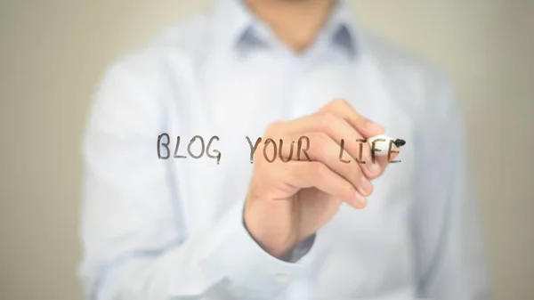 Blog Your Life, Man writing on transparent screen — Stock Photo, Image