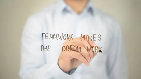 Teamwork Makes the Dream Work, Man Writing on Transparent Screen
